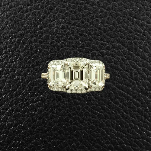 Triple Emerald cut Diamond Ring with Halo