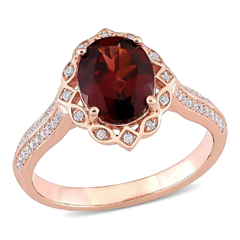 Miadora 14k Rose Gold Oval-cut Garnet and 1/6ct TDW Diamond Vintage Halo Ring